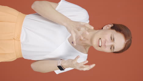 Vertical-video-of-Woman-having-a-nervous-breakdown-in-front-of-the-camera.